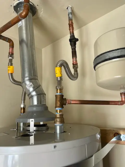 Water heater installation and plumbing repair in Woodtick Road